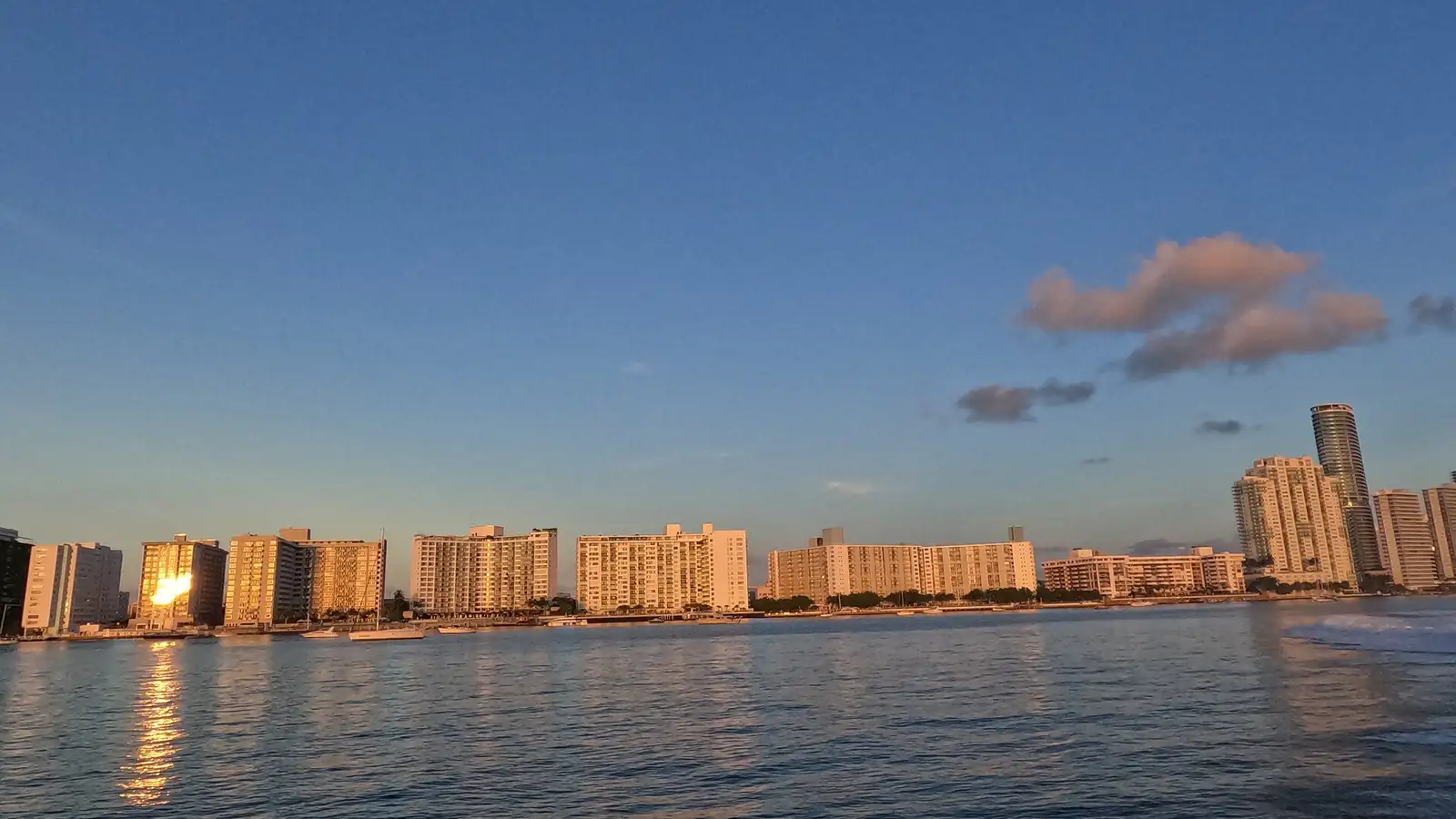 Miami Beach shoreline at sunset seen from the water